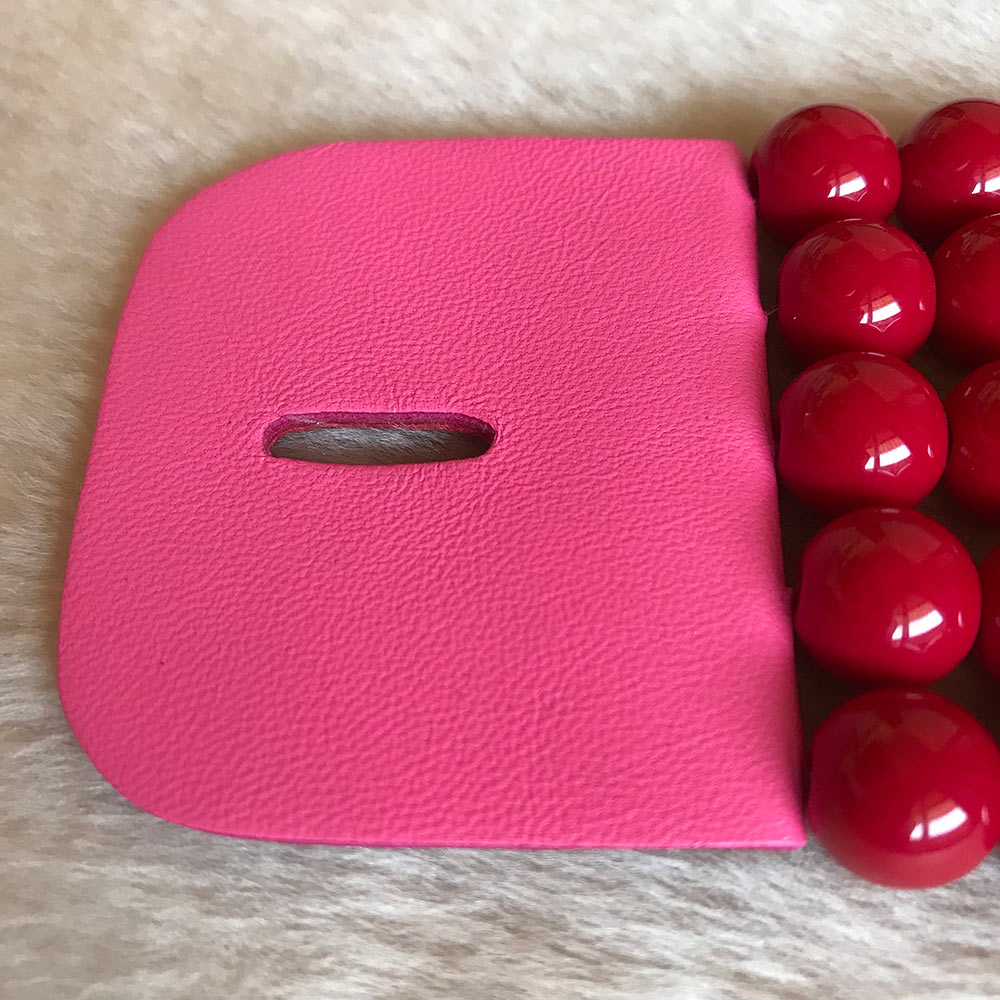 Nora rosso + pelle rosa