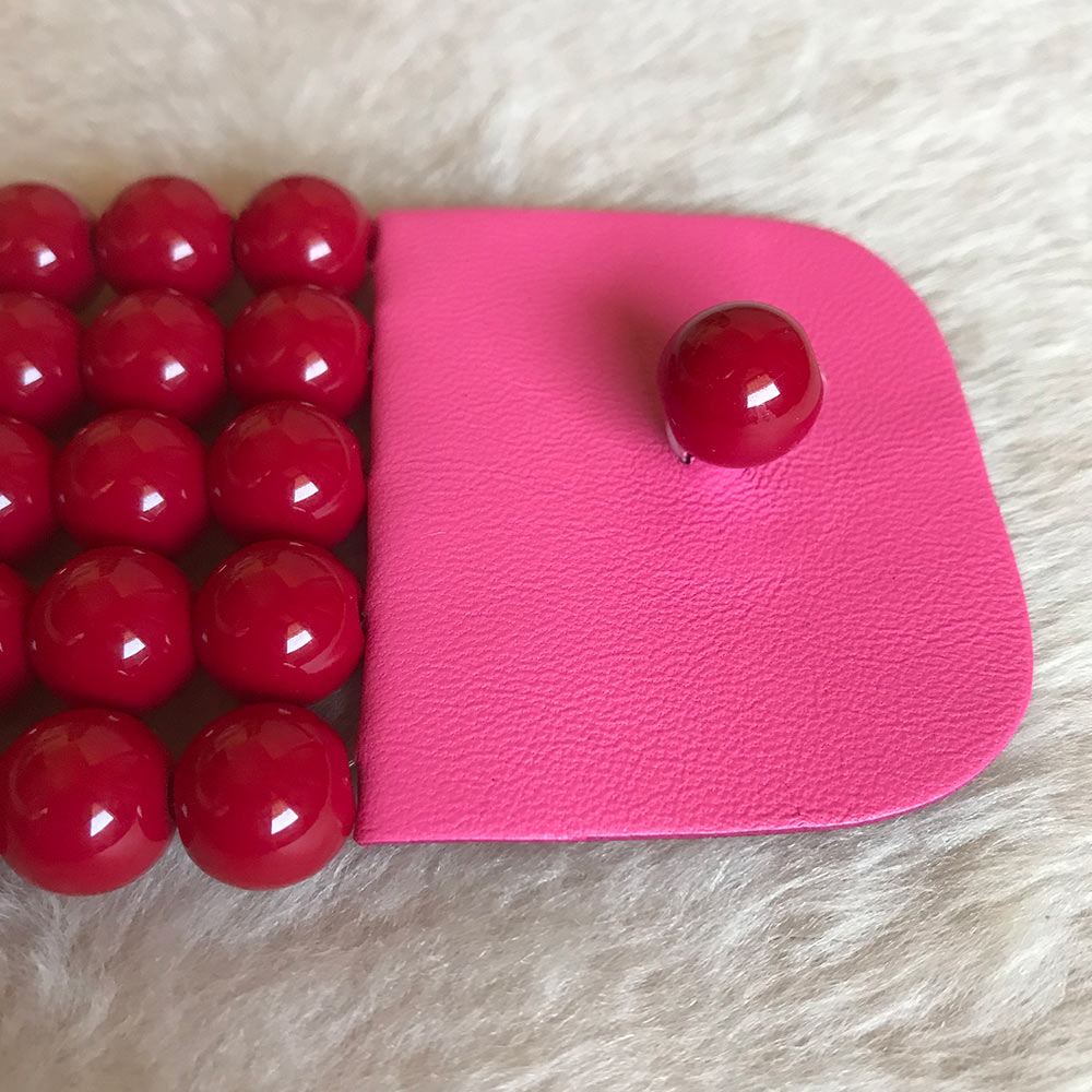 Nora rosso + pelle rosa